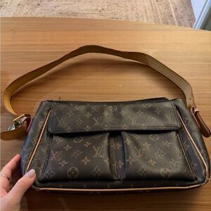 Authentic Louis Vuitton Red Interior with Gold Tag
